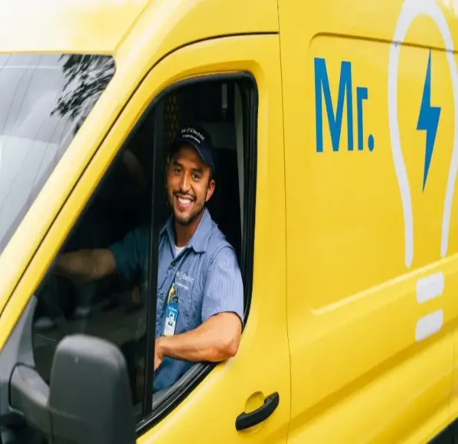 Mr. Electric of Central Iowa electrician sitting in truck.