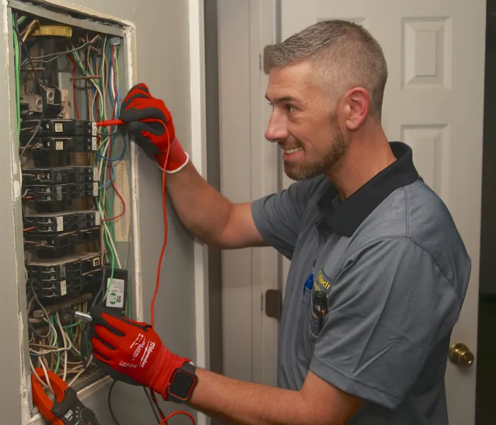 MRE electrician replacing an electrical panel. 