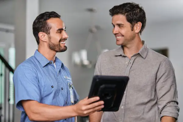 Electrician helping customer.