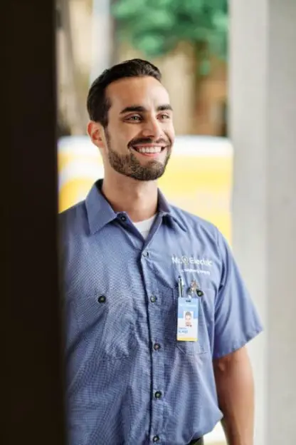 Mr. Electric electrician smiling.