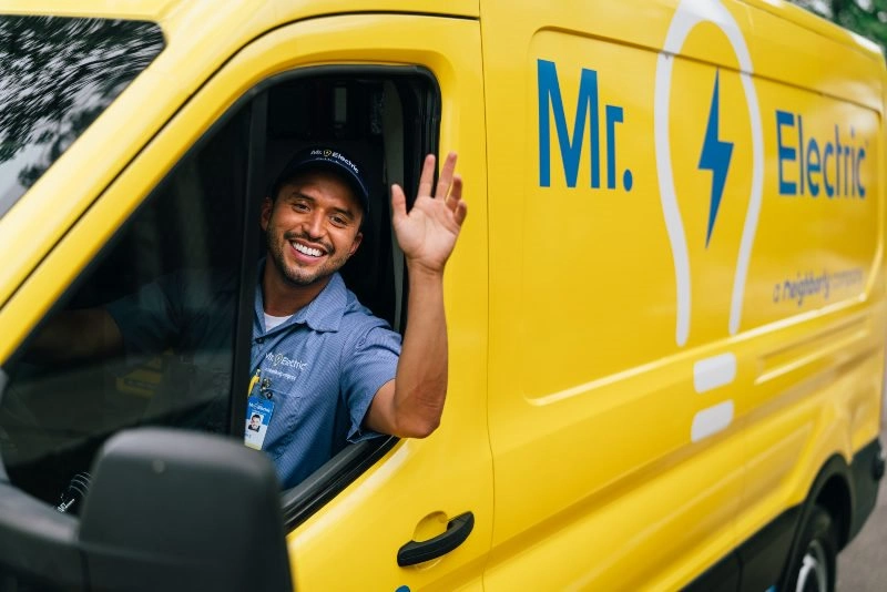 A Mr. Electric technician arriving to help with an electrical repair in Marshalltown, IA.