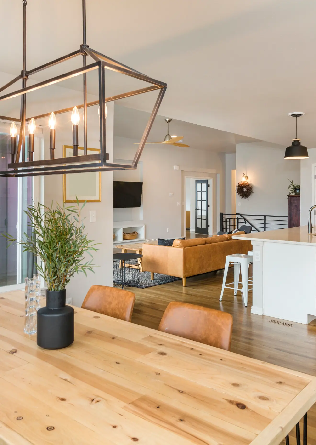 Dining room with a chandelier overhead.