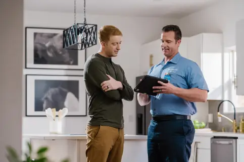 Electricians installing smart doorbells