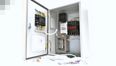 A picture of a white transfer switch.