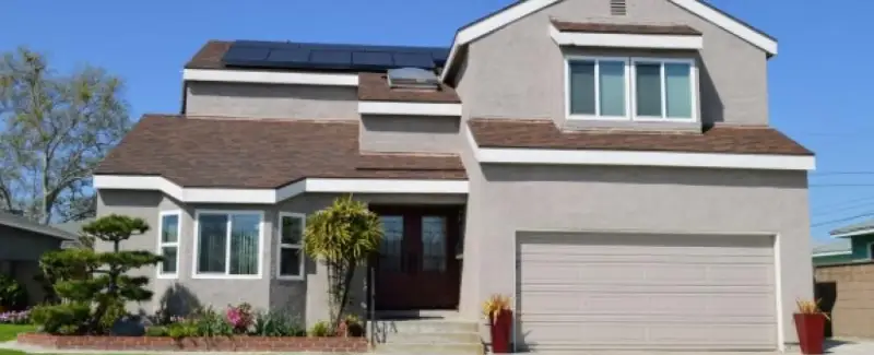 eco-friendly home with roof top solar panels.