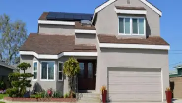 Eco-friendly home with roof top solar panels.