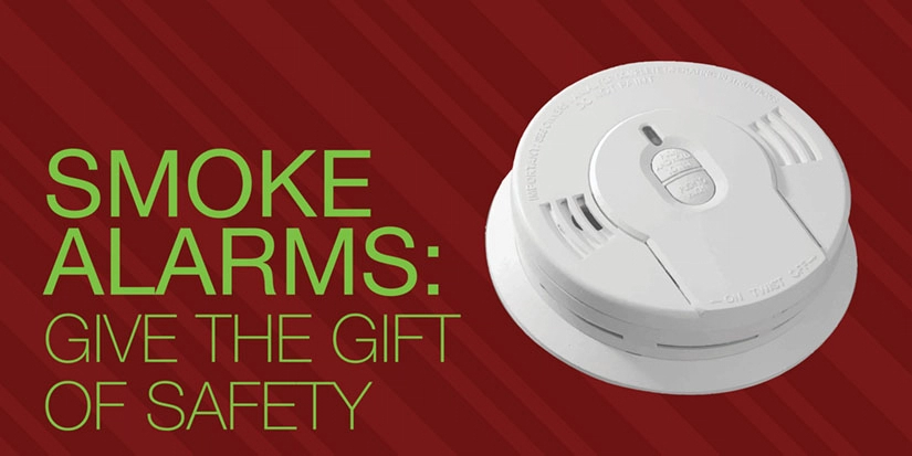 Picture of a white smoke alarm.